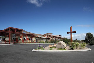 Cross at St Johns PS Dennington.jpg